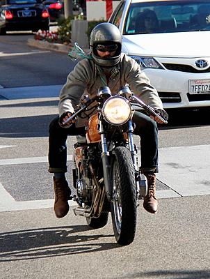 Keanu Reeves riding his motorbike with a silk scarf flying in the wind Featuring: Keanu Reeves Where: Los Angeles, California, United States When: 19 ...-stock-photo
